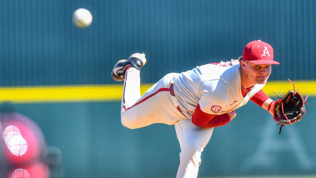 Razorbacks pitcher Dylan Carter throws a pitch against Tennessee on Sunday afternoon.